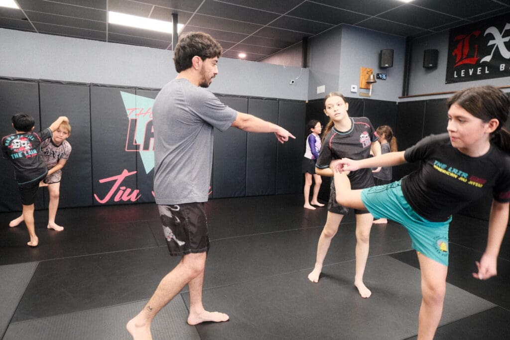 kids in Glendora Wrestling class improving focus, discipline, and listening skills through martial arts training